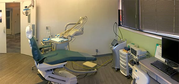 Operatory room for Marin Reconstructive Periodontics showing teeth cleaning tools and chair